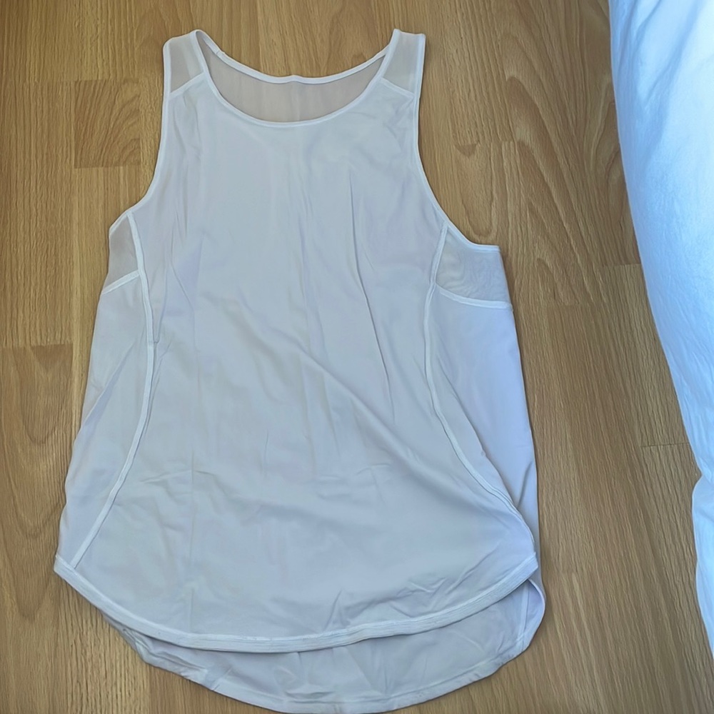 White Lululemon tank top.